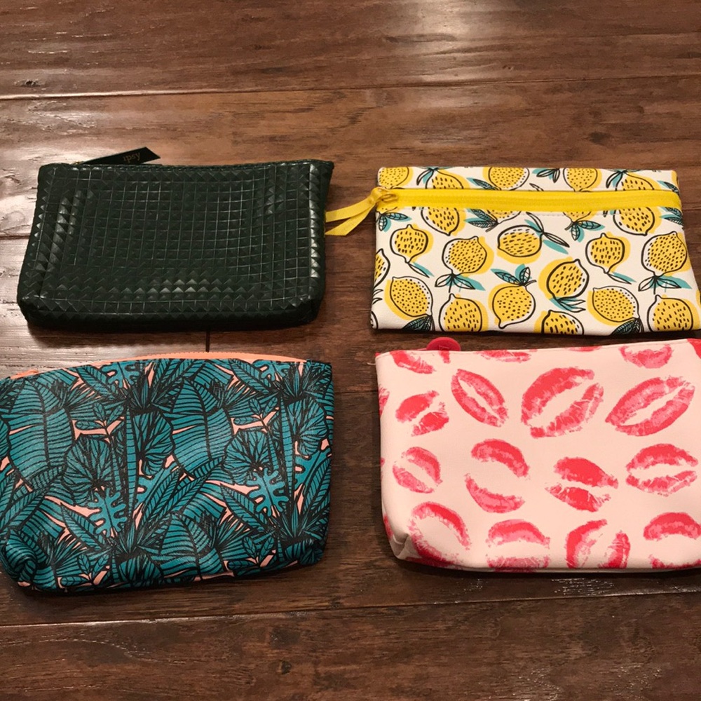 4 Ipsy bags. Never used. Make up bags